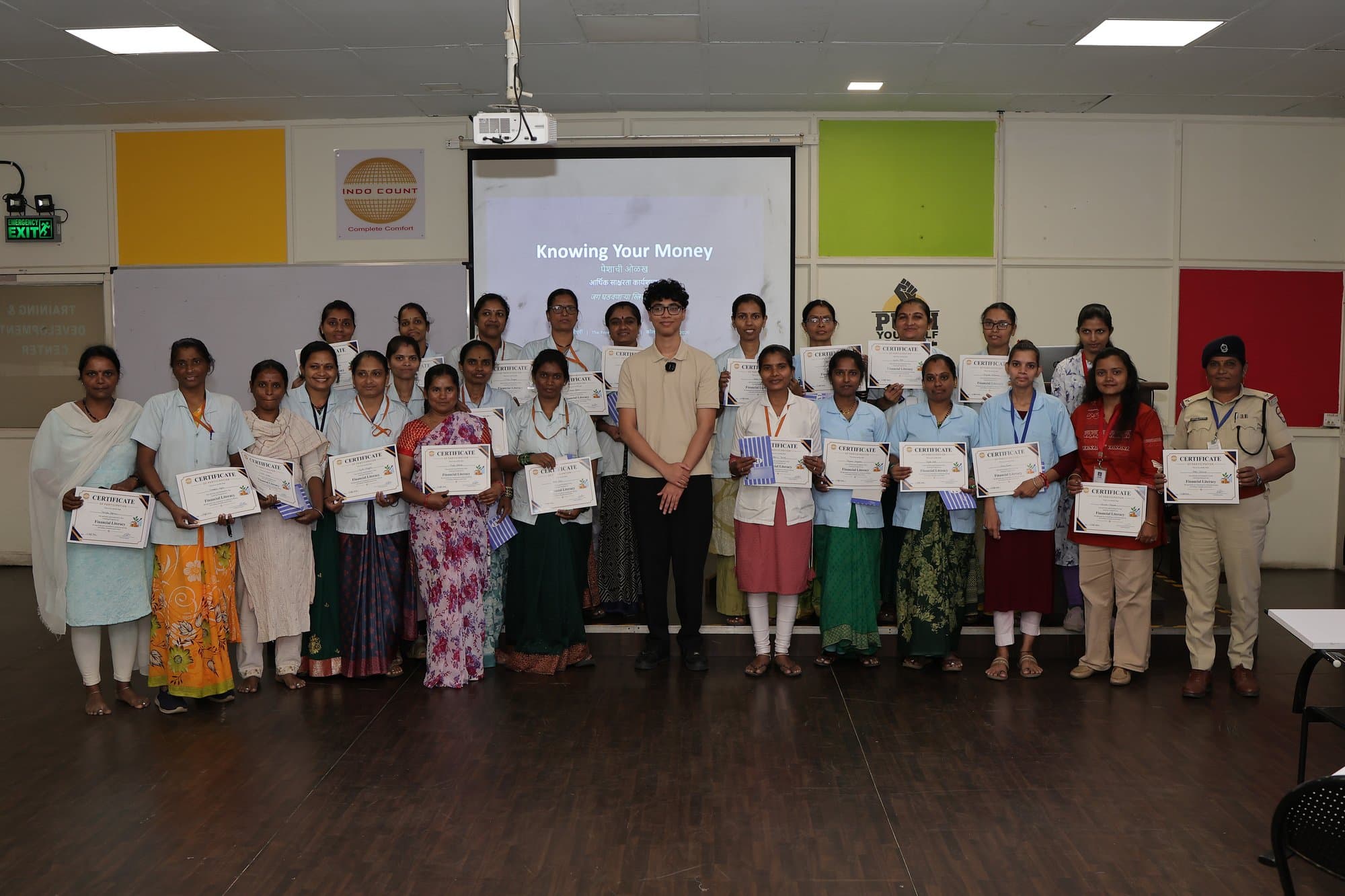 A Kolhapur group holding their certificates at the end of a workshop